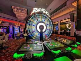 Studio live dealer Dragon Tiger di badaktoto dengan kamera multi-sudut
